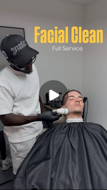 Abdoulaye giving a steam facial treatment to a reclined client